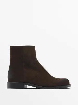 Greased split suede flat ankle boots