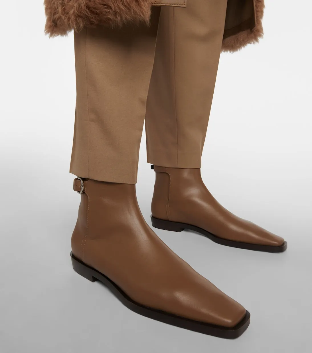 Leather ankle boots with Toteme belt, beige